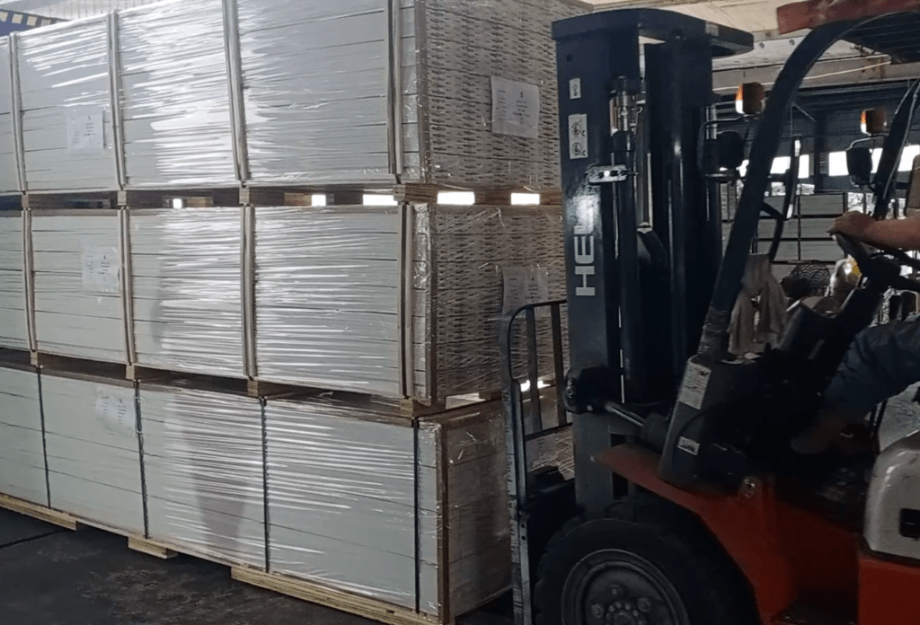The forklift is loading goods.