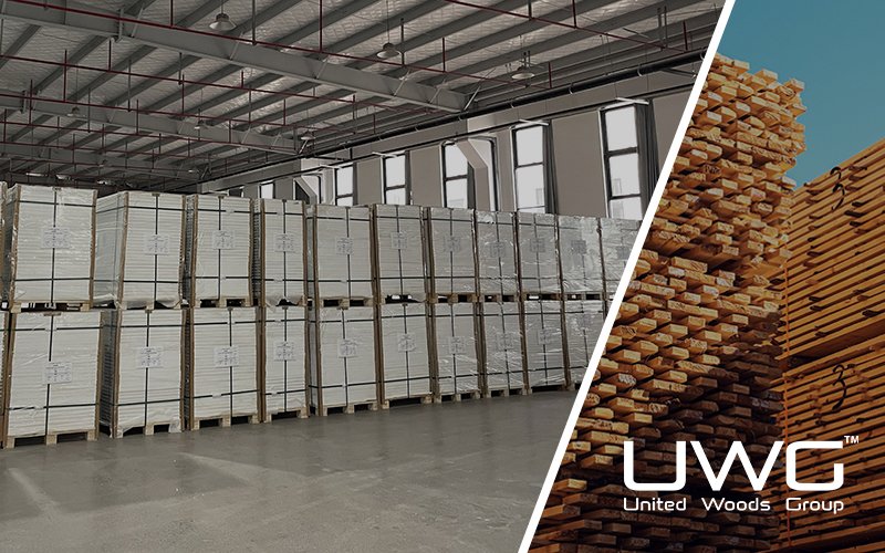 Stacks of packaged interior doors stored on pallets in a factory warehouse
