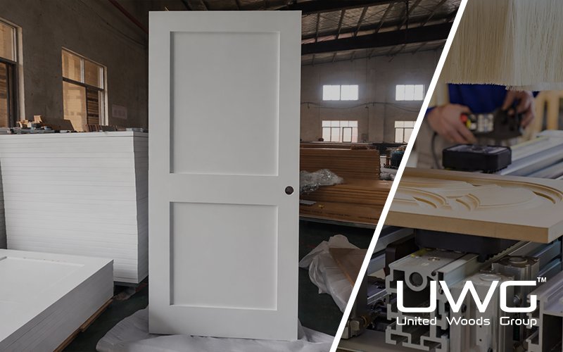 Primed two panel interior door displayed inside a door manufacturing factory