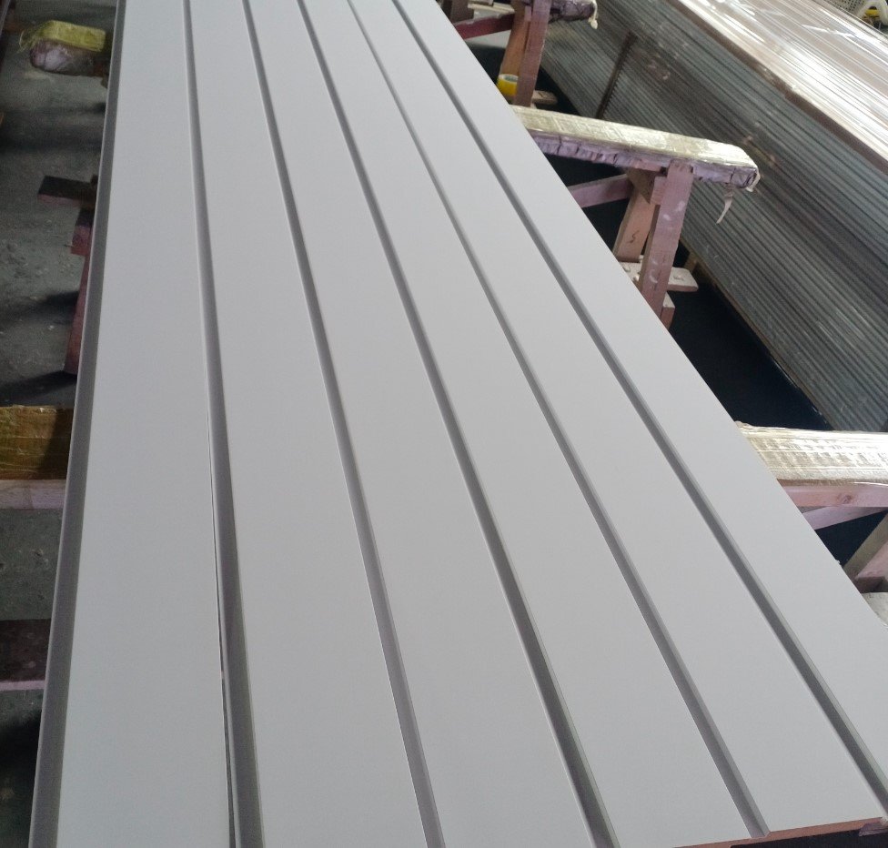 Factory-primed wainscoting panel boards with detailed grooves