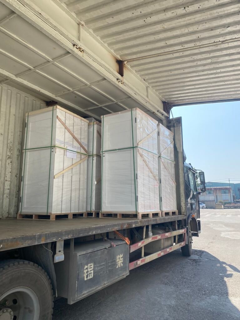 Packaged interior doors loaded on a truck for shipment from factory